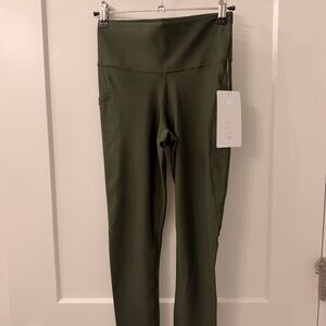 Athleta Olive Green Interval Stash 7/8 Tight